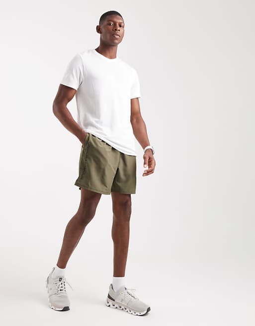 Under Armour Tech Woven Wordmark Shorts In Marine Green