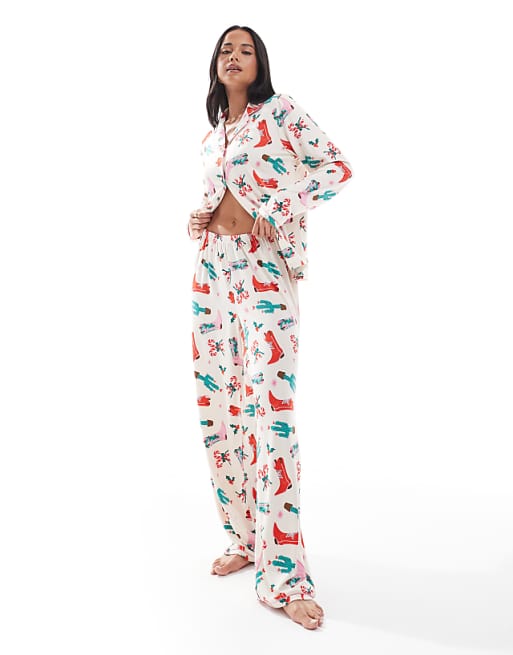 Urban Threads Christmas long sleeve revere and trouser pyjama set in cowboy print