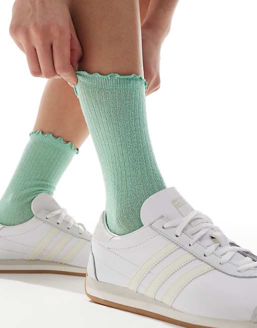 Vero Moda ribbed glitter sock with frill edge in green