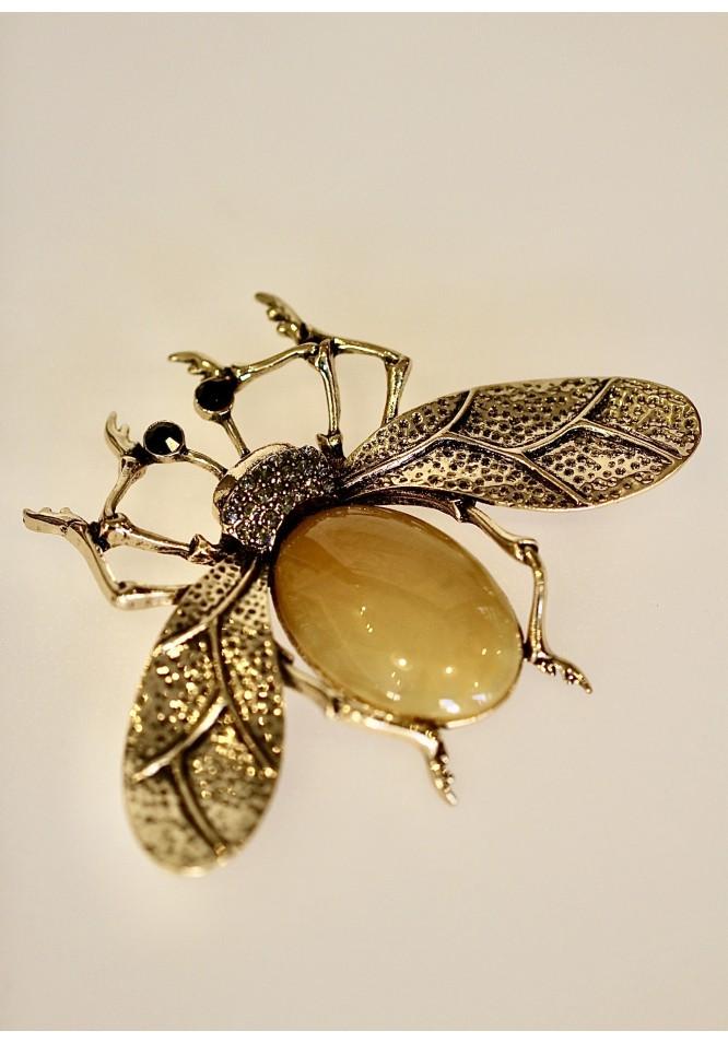 la muse Giant mustard bug brooch
