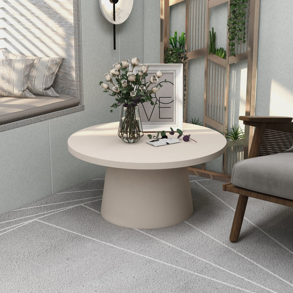 Leisure Mod Dune Round 32" Wide Coffee Table In Fiberstone With A Pedestal Base