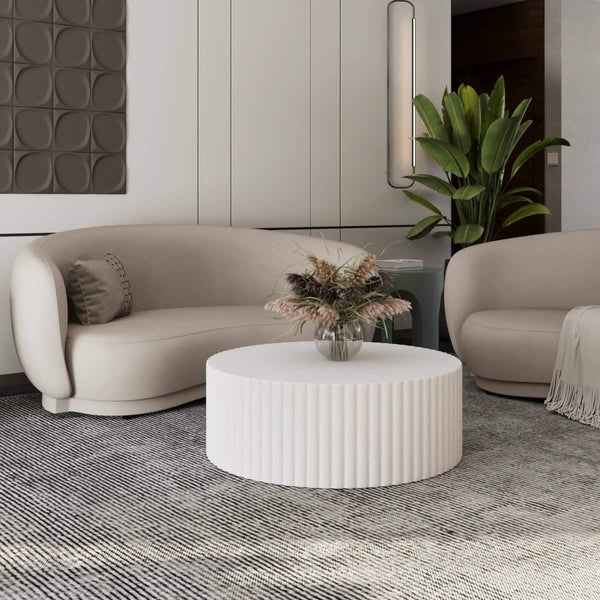 Leisure Mod Milena 42" Round White Fiberstone Coffee Table With Fluted Base – Indoor/Outdoor