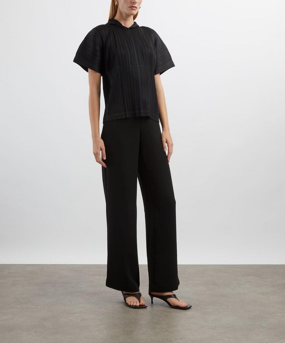 liberty london Pleats Please Issey Miyake MONTHLY COLOURS: AUGUST Black Pleated Hooded Top