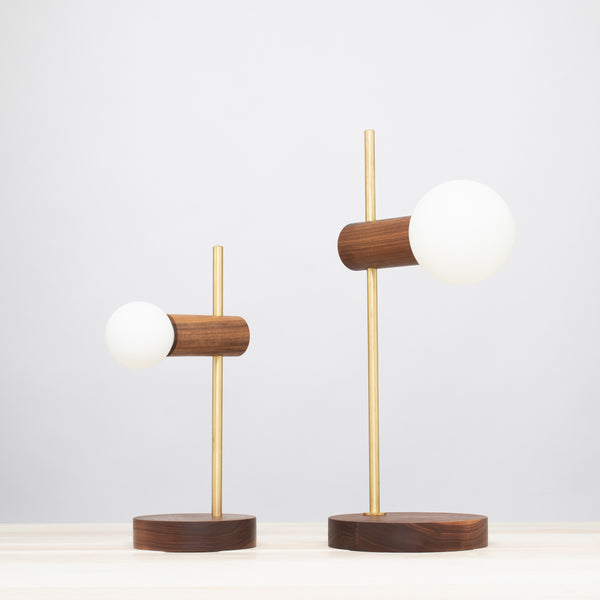 lights of london Stem Brass and Walnut table lamp with Sphere Dim to Warm bulbs