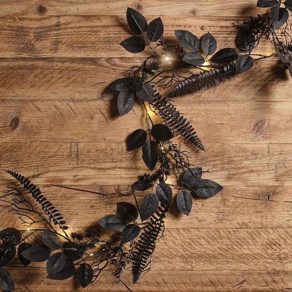lights4fun 1.8m Pre Lit Black Foliage Halloween Garland