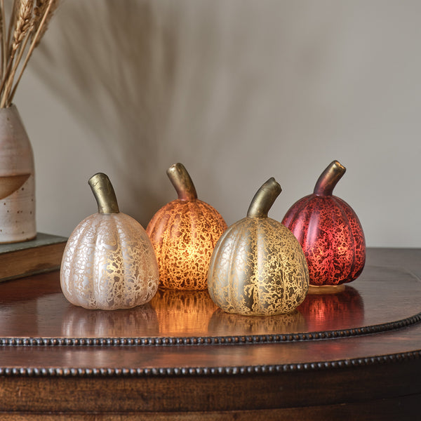 lights4fun Set of 4 Mini Glass Light Up Pumpkin Decorations