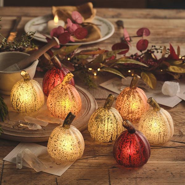 lights4fun Set of 8 Mini Glass Light Up Pumpkin Decorations