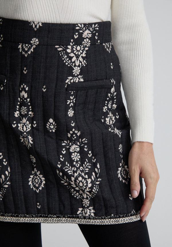 Lily And Lionel Nala Quilted Floral Print Mini Skirt In Black