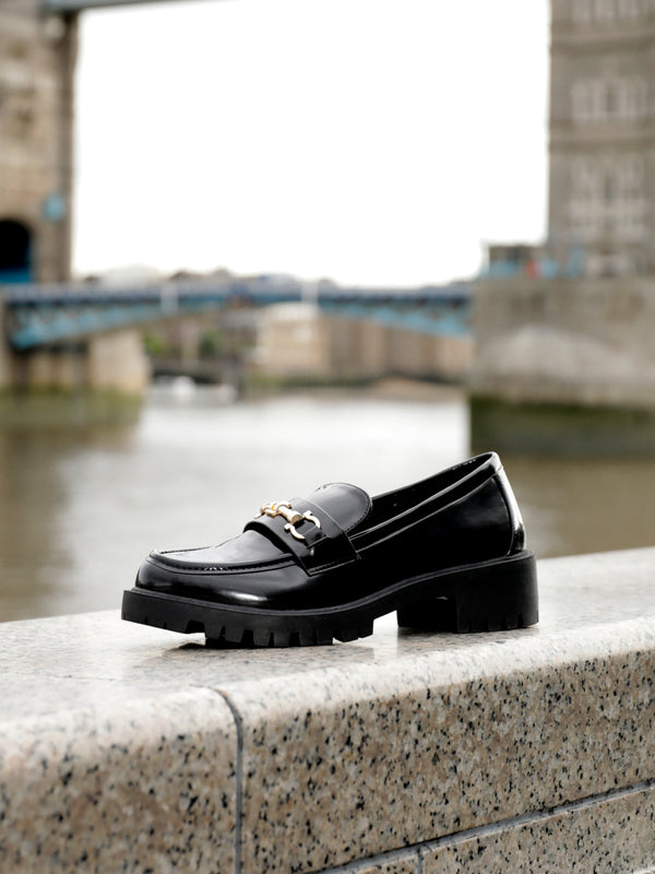 linzi Black Faux High Shine Leather Chunky Sole Loafer With Gold Trim