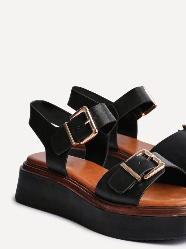 Linzi Black Faux Leather Flatform Sandals With Large Buckle Detail