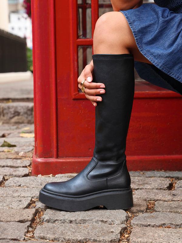 linzi Black Faux Leather High Leg Stretch Boot With Chunky Platform Sole