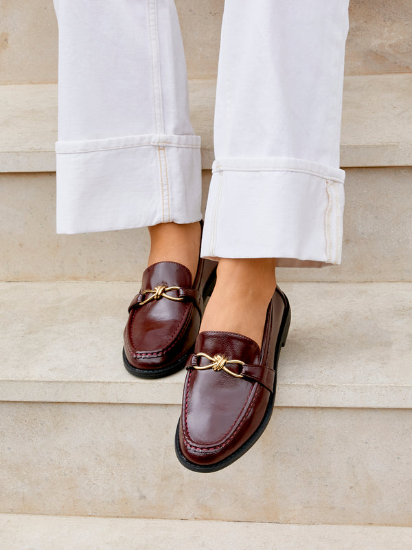 linzi Burgundy Faux Leather Slip On Loafer With Buckle Detail
