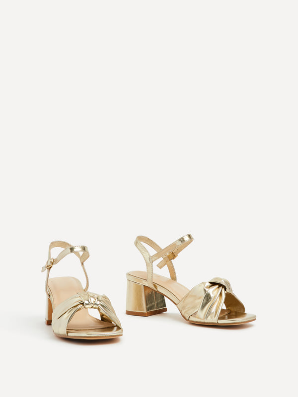 Linzi Gold Faux Leather Block Heeled Sandal With Knotted Front Strap