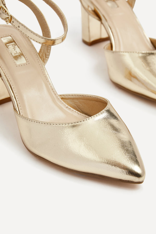 Linzi Gold Faux Leather Mid Height Court Shoe With Sandal Back