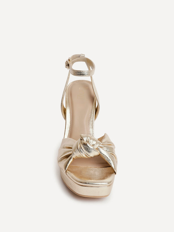 Linzi Gold Faux Leather Platform Heel With Knotted Front Strap