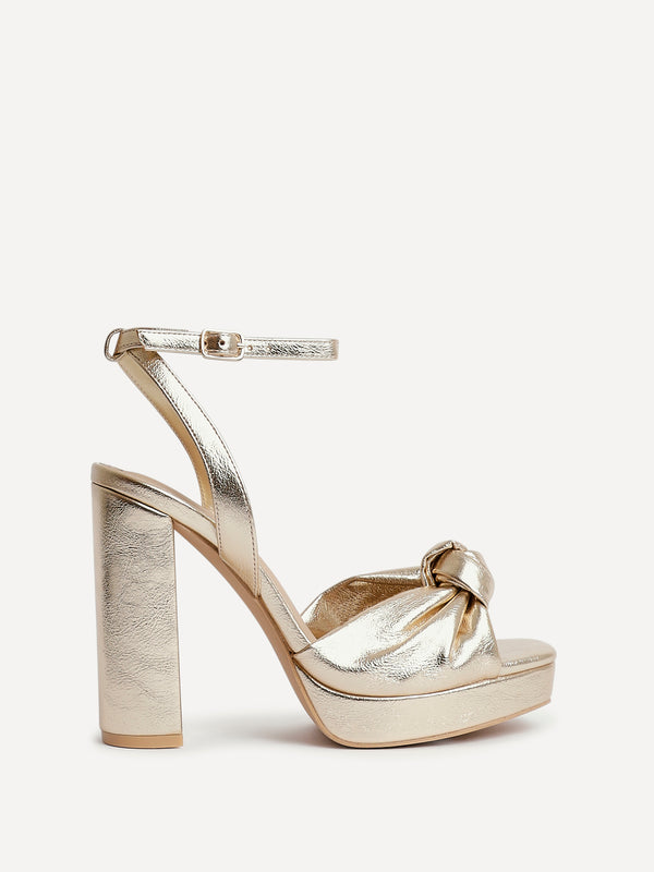 Linzi Gold Faux Leather Platform Heel With Knotted Front Strap