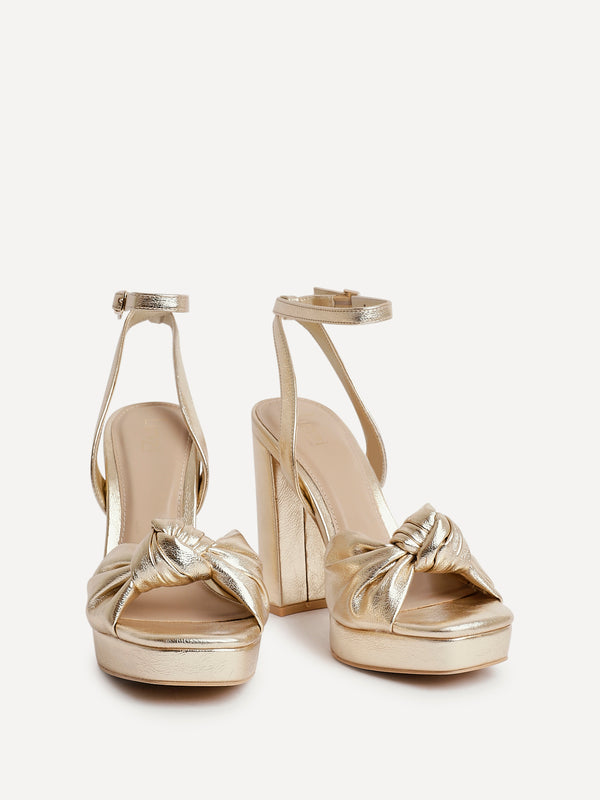 Linzi Gold Faux Leather Platform Heel With Knotted Front Strap
