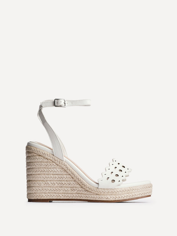 Linzi White Faux Leather Wedge With Cut Out Design