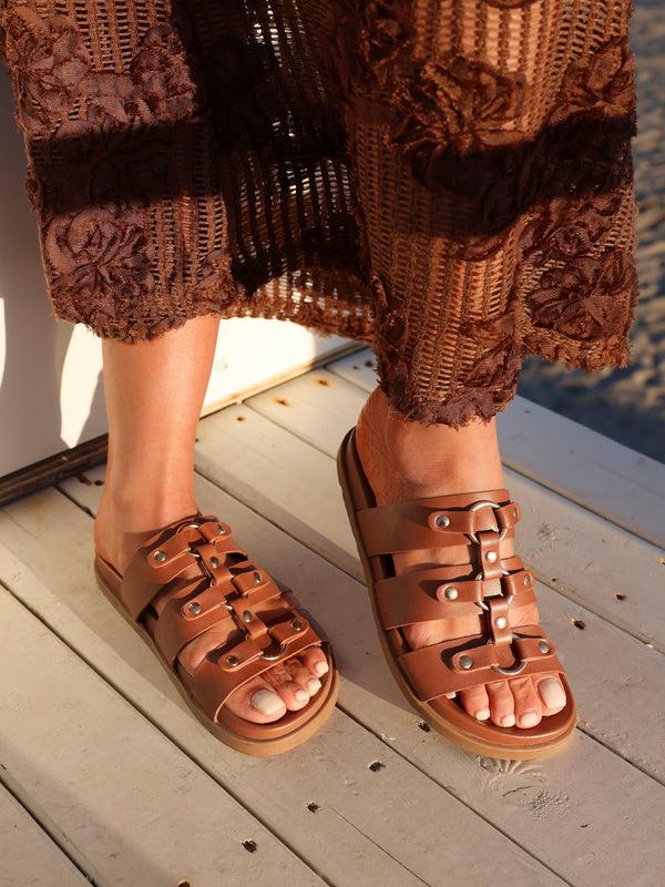 linzi Tan Faux Leather Studded Gladiator Slip On Sandals