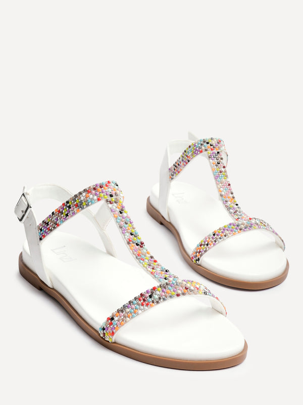 Linzi White Faux Leather T-Bar Flat Sandal With Multi Coloured Beading Detail