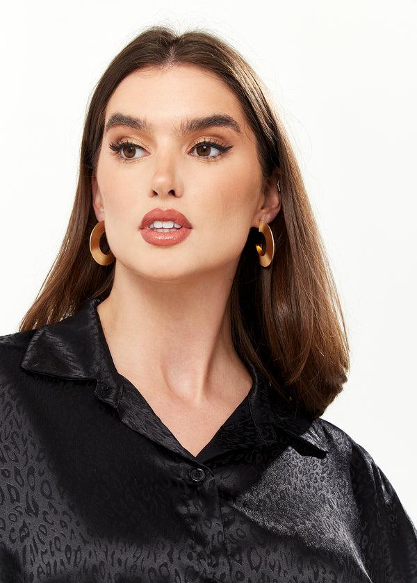 Liquorish Divine Grace Flattened Hoop Earrings In Gold