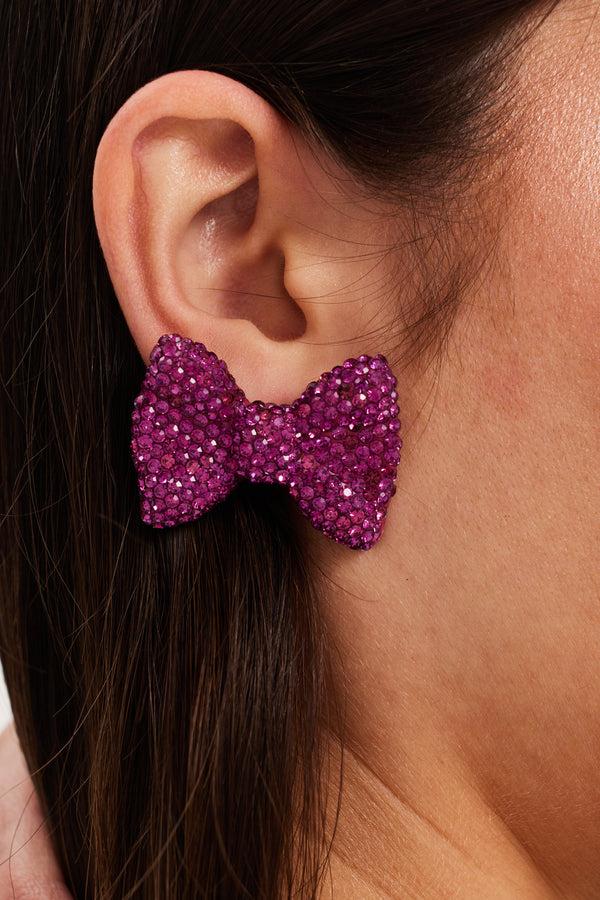 Liquorish Liquorish Diamonte Bow Stud Earrings In Pink