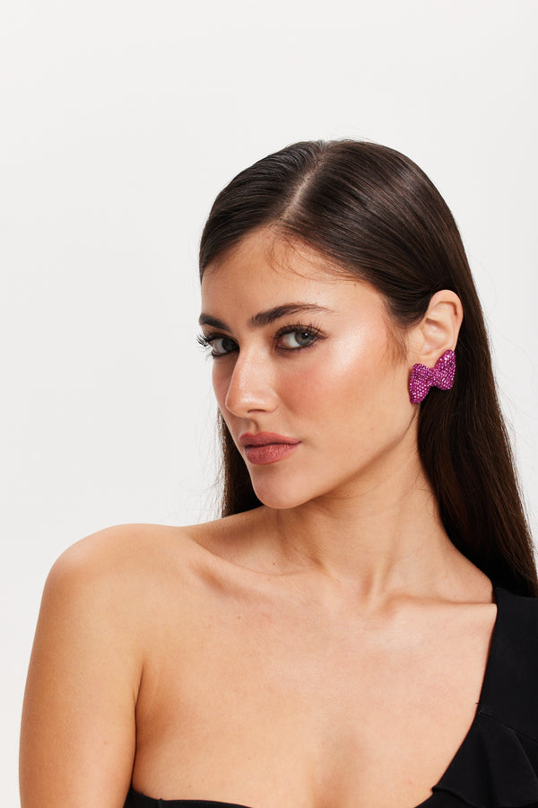 Liquorish Liquorish Diamonte Bow Stud Earrings In Pink