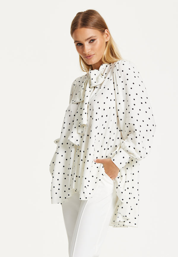 Liquorish Polka Dot Ruffle High-Low Blouse