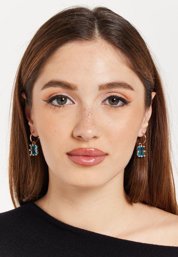 Liquorish Sky-Blue Baguette Huggie Drop Earrings In Gold
