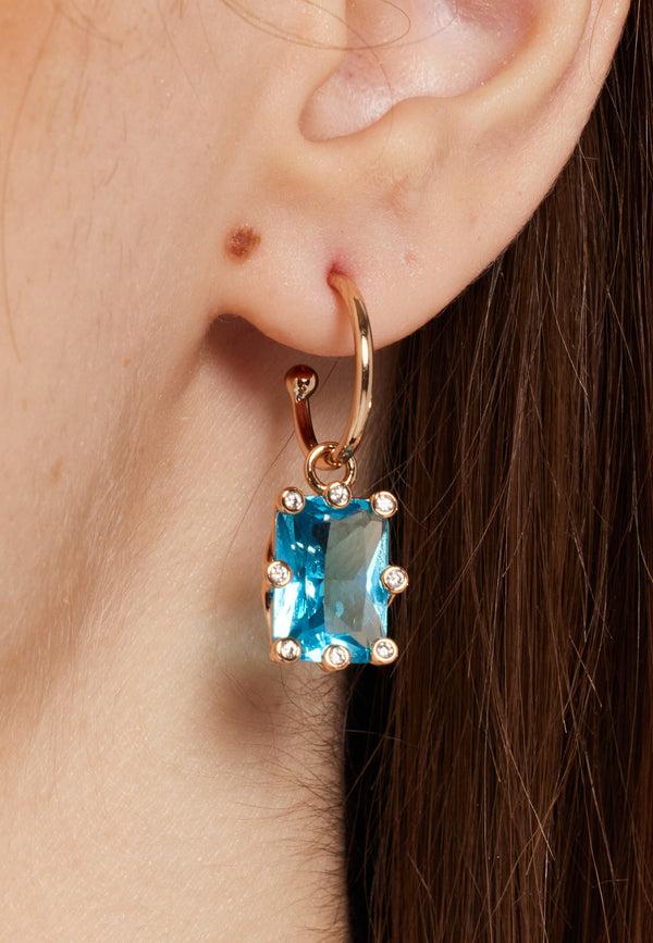 Liquorish Sky-Blue Baguette Huggie Drop Earrings In Gold
