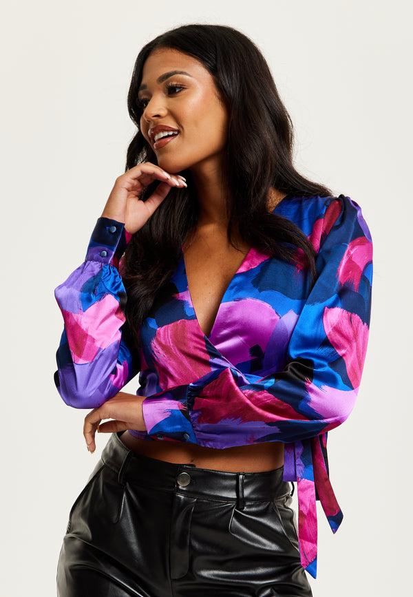 Liquorish Women's Abstract Print Wrap Top In Blue And Purple With Long Sleeves Deep V-Neckline And Crop Fit For Date Night