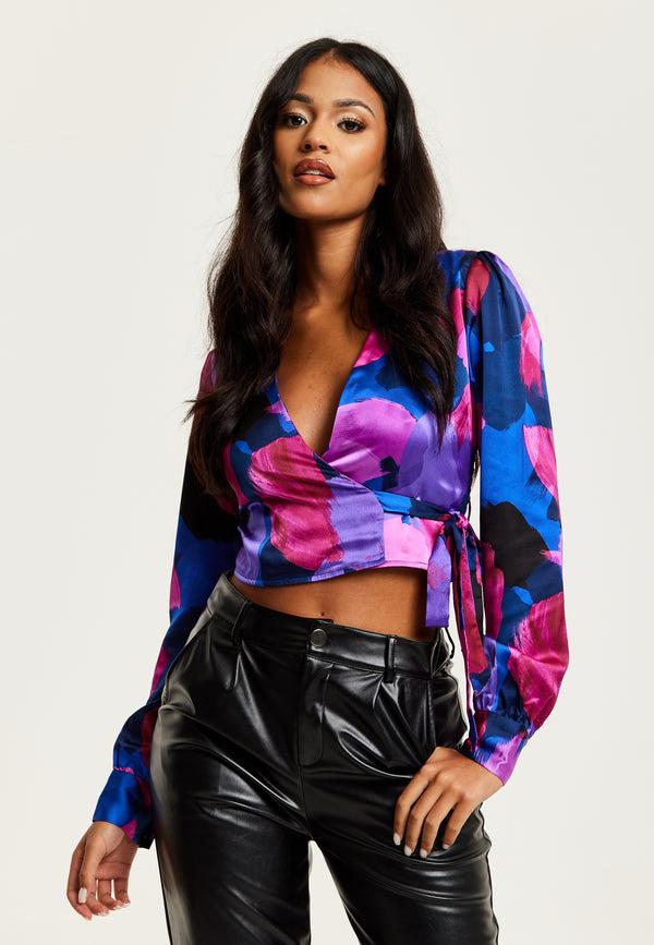 Liquorish Women's Abstract Print Wrap Top in Blue and Purple with Long Sleeves Deep V-Neckline and Crop Fit for Date Night
