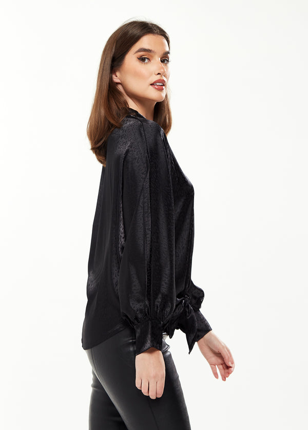 Liquorish Women's Divine Grace Leopard Jacquard Blouse With Front Waist Tie In Black Long Sleeves Button Front And Collar