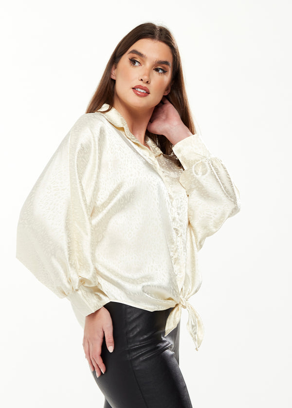 Liquorish Women's Divine Grace Leopard Jacquard Blouse with Front Waist Tie in Off White Long Sleeves Button Front Collar