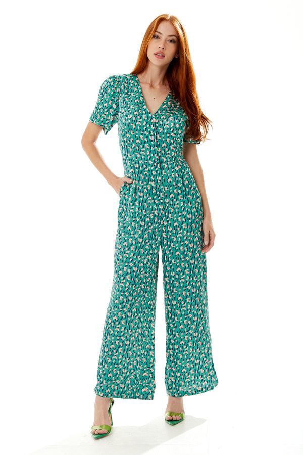 Liquorish Women's Jumpsuit in Green with Stroke Print Short Sleeves V Neck Wide Leg Design - Liquorish