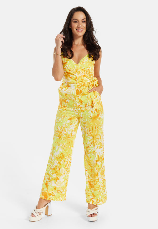 Liquorish Women's Jumpsuit in Yellow and Orange Floral Print with V-Neck Adjustable Straps and Tie Waist - Liquorish