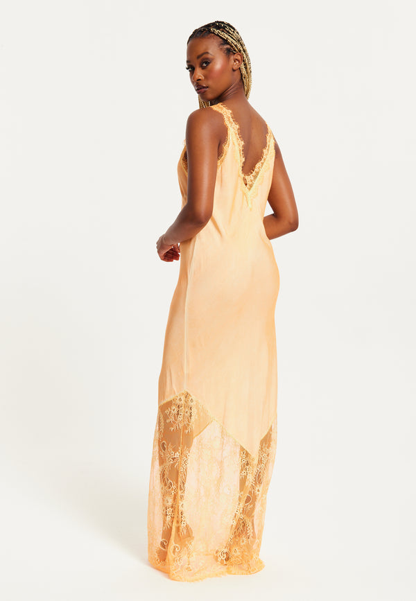 Liquorish Women's Maxi Dress With Lace Detail Deep V-Neck Flowing Silhouette In Orange - Liquorish