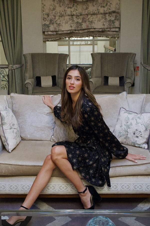 Liquorish Women's Mini Dress In Black With Long Sleeves Gold Star & Polka Dot Print Wrap Design - Liquorish