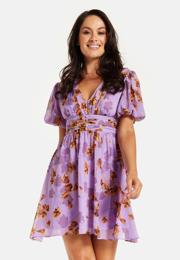 Liquorish Women's Mini Dress In Purple Floral With Short Sleeves And Deep V Neck - Stylish Button Waistband By Liquorish