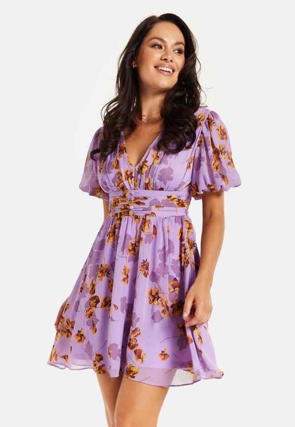Liquorish Women's Mini Dress In Purple Floral With Short Sleeves And Deep V Neck - Stylish Button Waistband By Liquorish