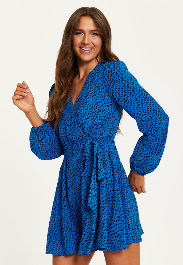 Liquorish Women's Mini Dress In Royal Blue With Long Sleeves And Heart Print Wrap Design By Liquorish