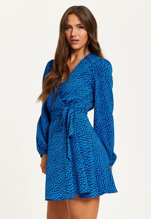 Liquorish Women's Mini Dress In Royal Blue With Long Sleeves And Heart Print Wrap Design By Liquorish