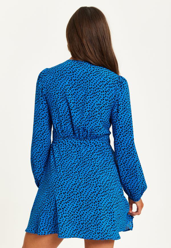 Liquorish Women's Mini Dress In Royal Blue With Long Sleeves And Heart Print Wrap Design By Liquorish
