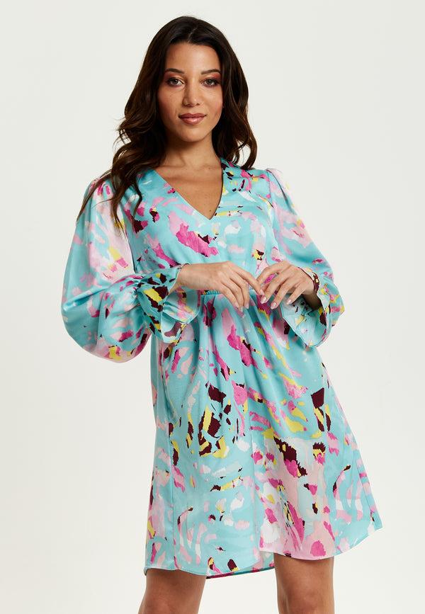 Liquorish Women's Mini Dress With Long Sleeves Blue Abstract Print Open Back Design Chic & Flattering - Liquorish