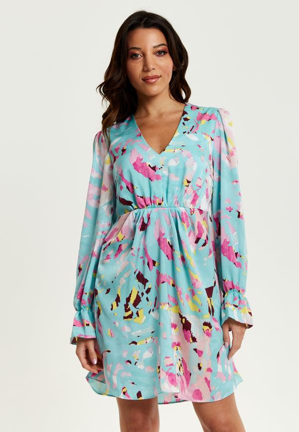 Liquorish Women's Mini Dress With Long Sleeves Blue Abstract Print Open Back Design Chic & Flattering - Liquorish