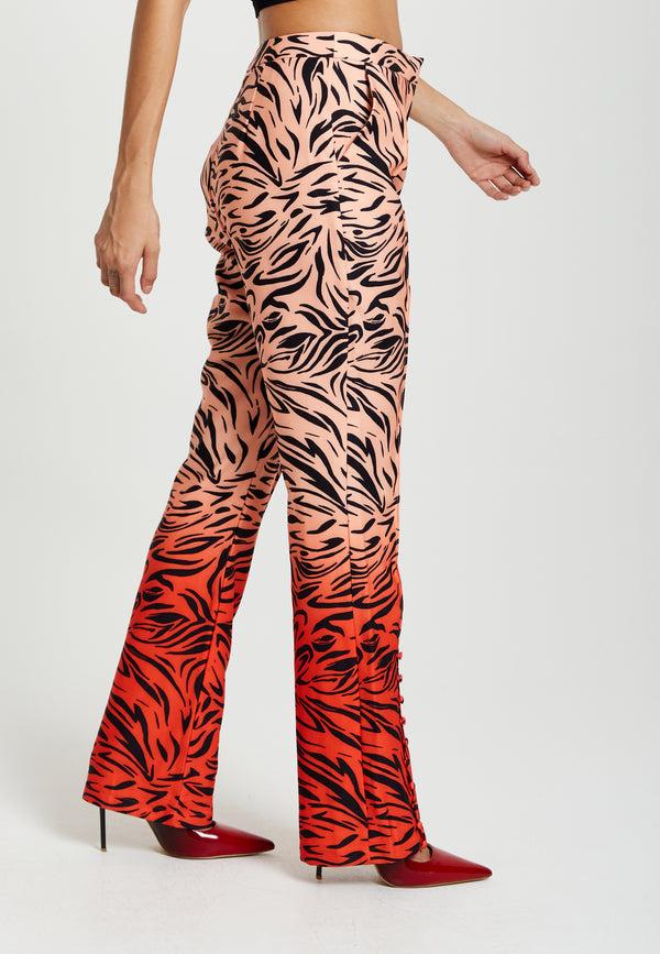 Liquorish Women's Trousers In Orange And Nude Zebra Print With Slit Detail And Button Closure By Liquorish