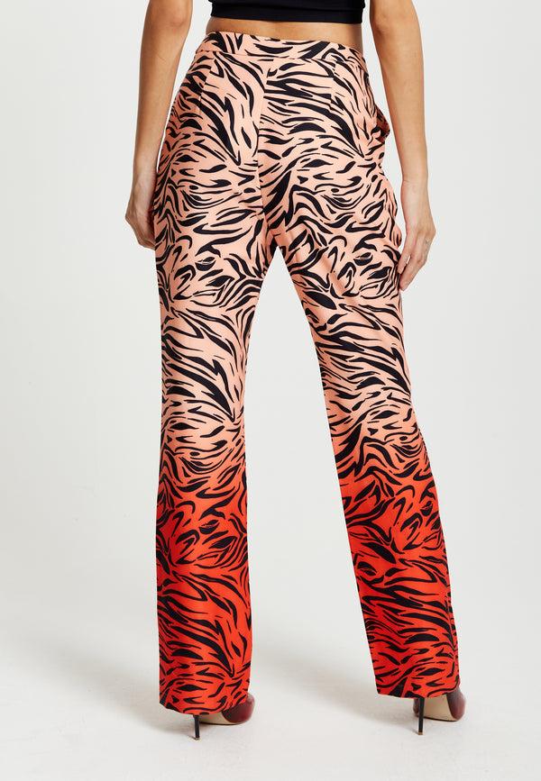 Liquorish Women's Trousers In Orange And Nude Zebra Print With Slit Detail And Button Closure By Liquorish