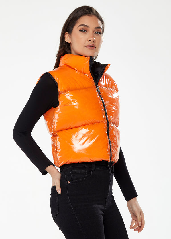 Liquorish Women's Wet Look Gilet In Orange - Sleeveless High Neck Zip Closure Cropped Fit Regular Fit Available In Classic And Bright Colours