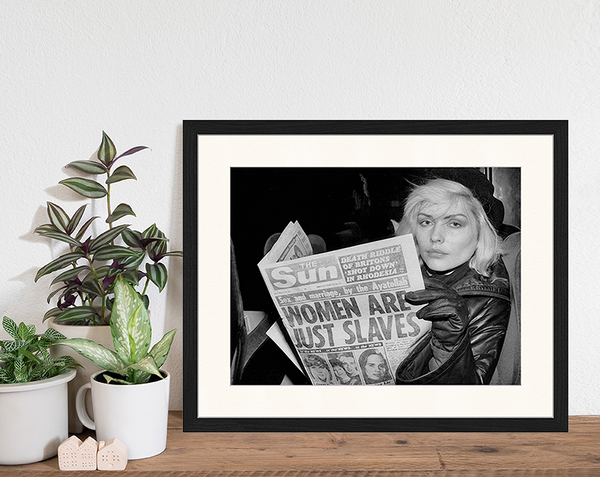 Liv Corday Reading The News