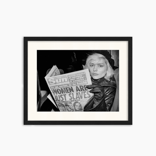 liv corday Reading the news